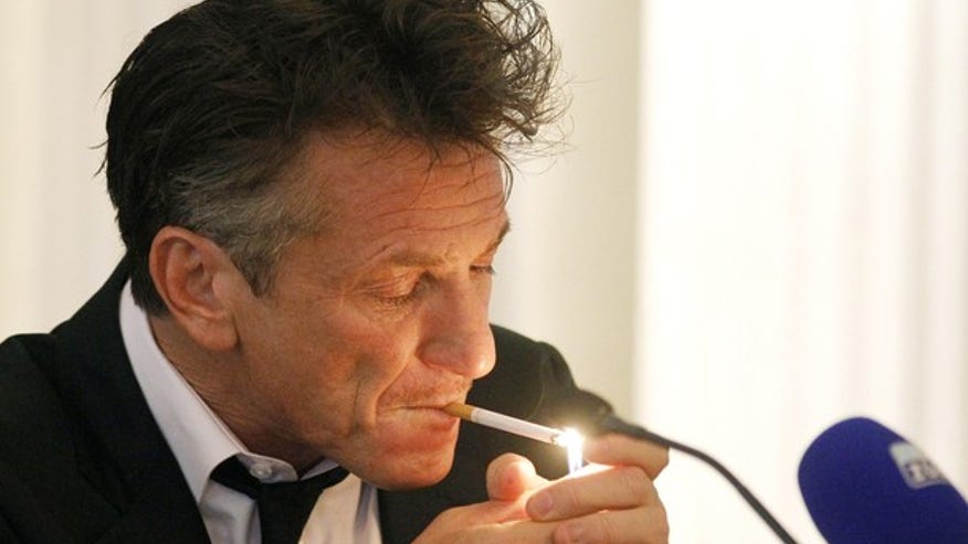 sean penn lights up_092811